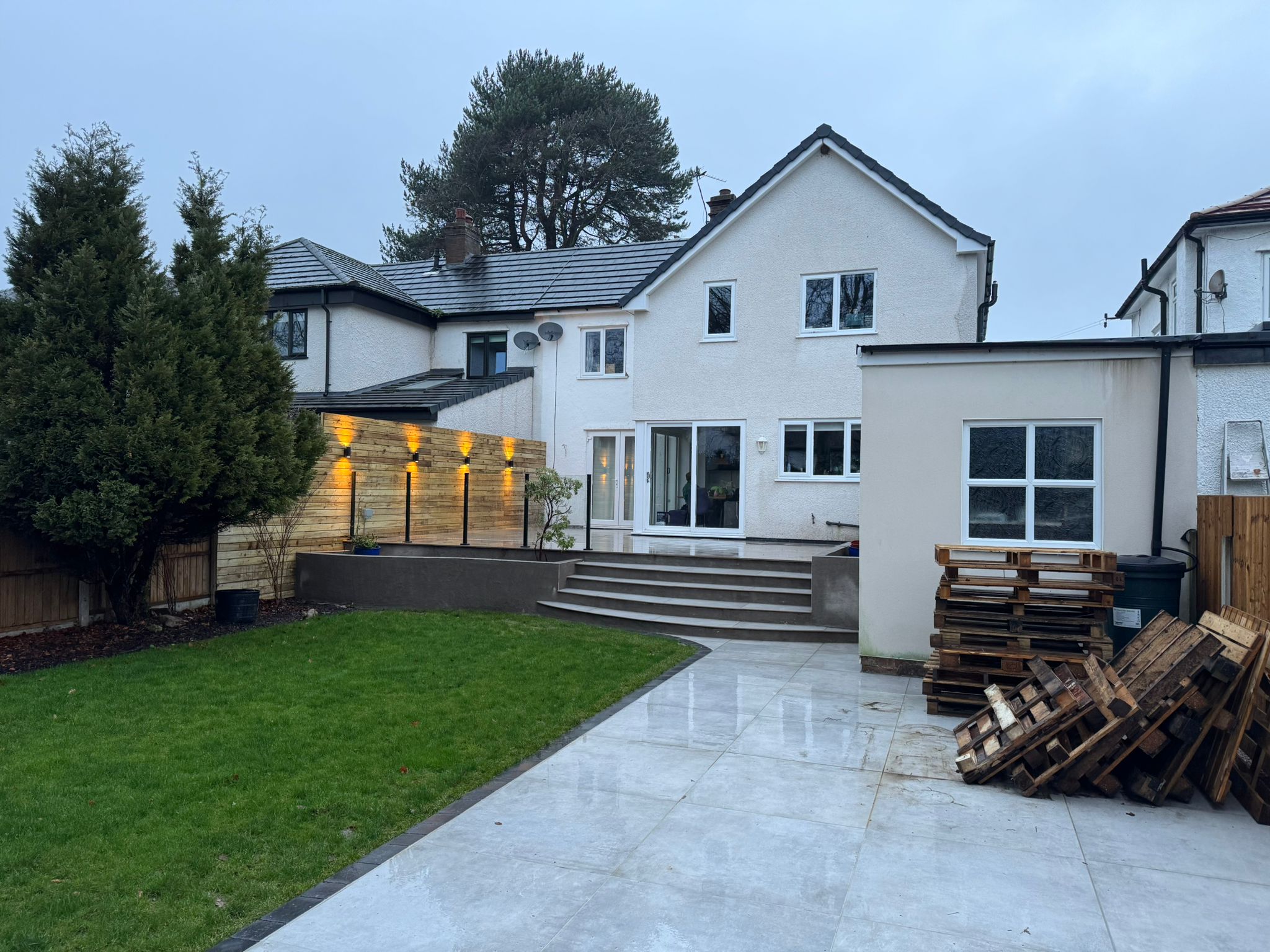Garden and patio lighting at the rear of a home