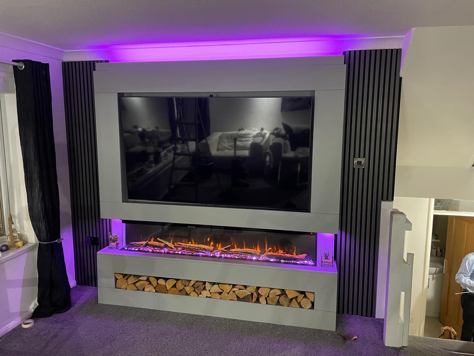 Media wall with purple LED feature lighting